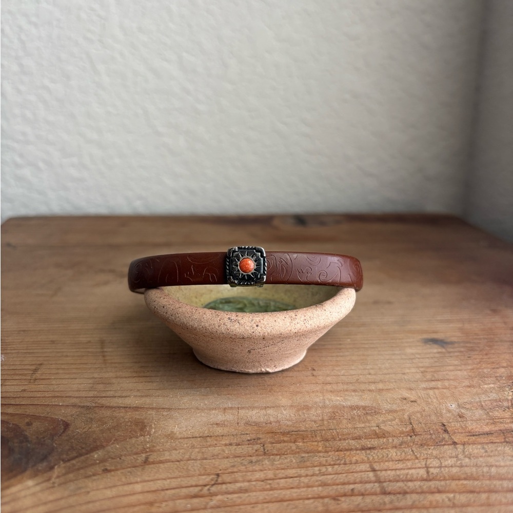 Genuine leather, Prerogatives bracelet with sterling and stone ‘sun’ charm. .925